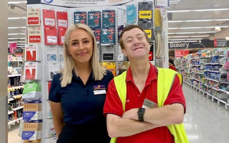 Coles employee and Sureway ESO Mia at Andrew's workplace