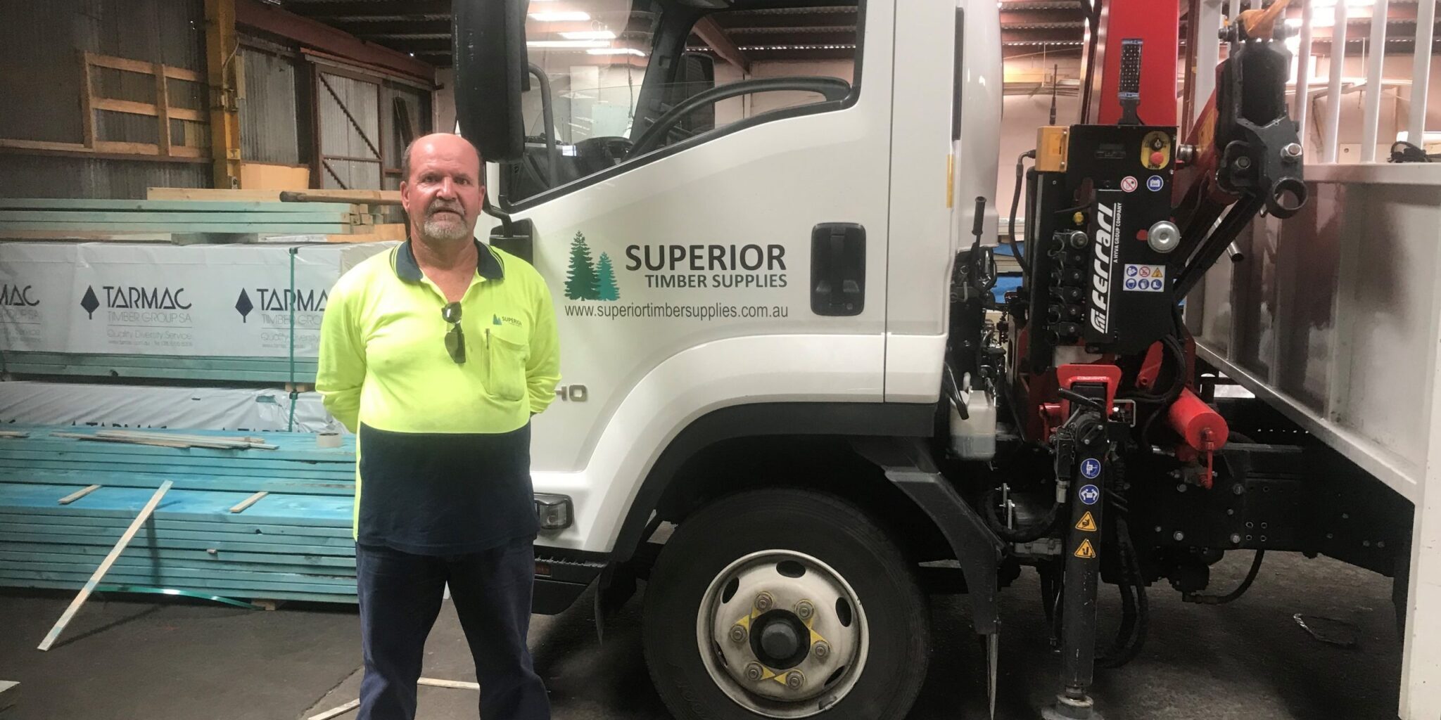 Port Pirie Adelaide Truck driver Terrence stands next to his truck at work